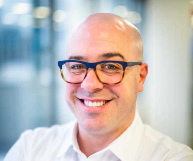 Portrait of Justin Ruehs.