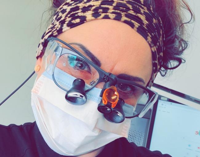 Portrait of Michelle Murdoch wearing her dental gear.