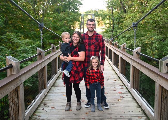 Morgan Brink never dreamed she’d excel in college. Now at 32, she’s on the Dean’s List at GRCC and working toward graduating with honors. Brink is shown here with her husband, Brandon, and their children, Beau, left and Thea.