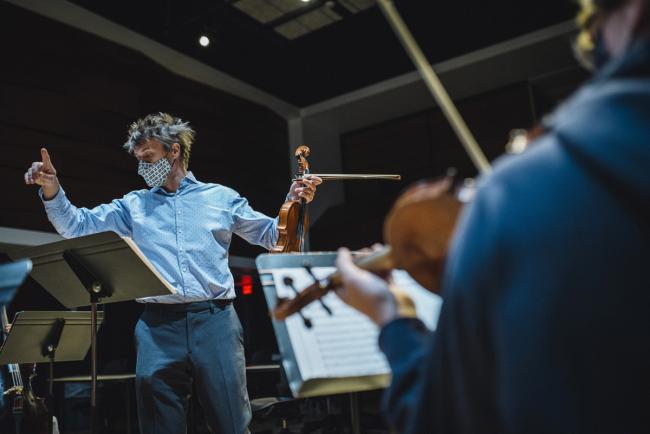 Professor Libor Ondras working with students.