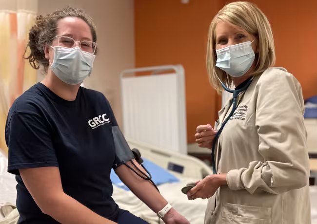 Shelley Anderson and Nicole Freeman training for Medical Assistant program.