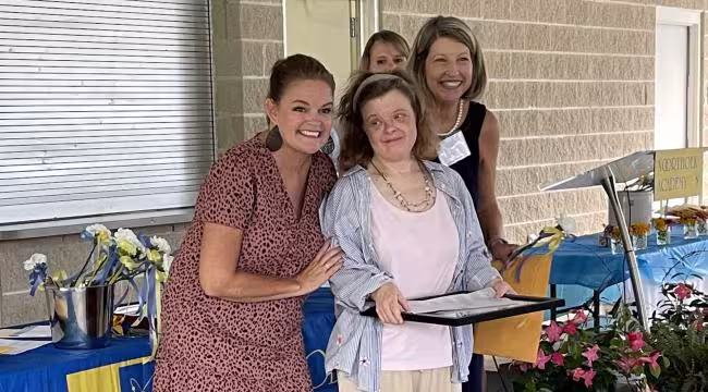 Noorthoek Academy staff celebrating Katherine Crouch.