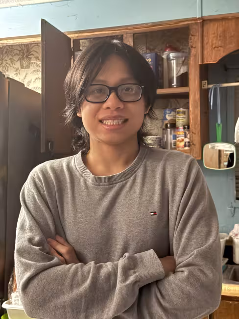 GRCC student Phillip Huynh poses for a photo at home.