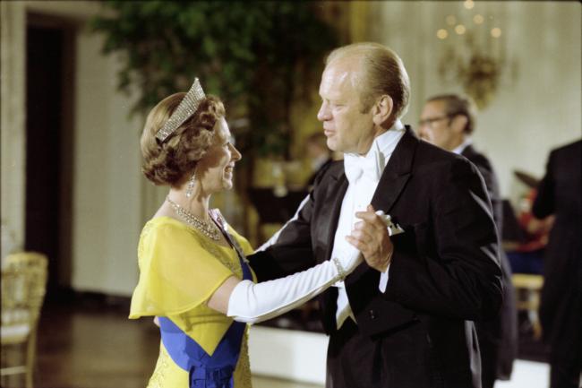 Queen Elizabeth II and President Gerald R. Ford waltzing.