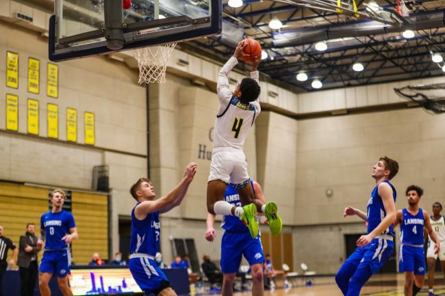 Ryel Daye leaping for a basket.