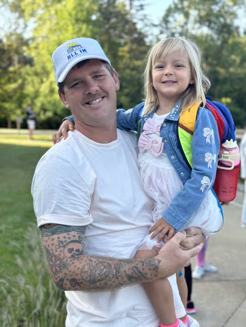 GRCC alumnus Samuel Wright and his daughter.