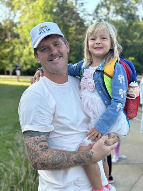 GRCC alumnus Samuel Wright and his daughter.