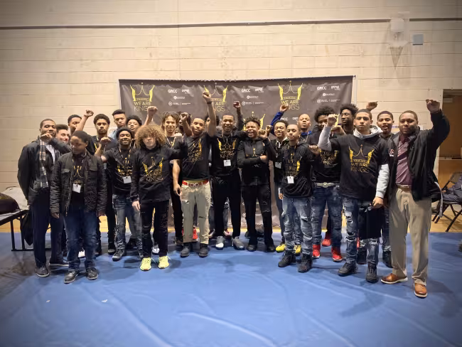 Students attending a prior year's conference in matching t-shirts.