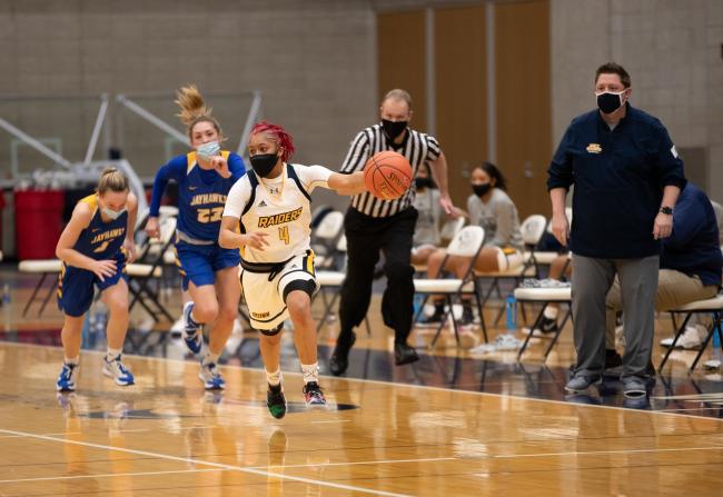 Player of the year Shonyah Hawkins and Coach of the Year David Glazier in action.
