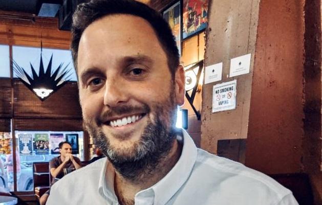 Portrait of Justin Vogelar.