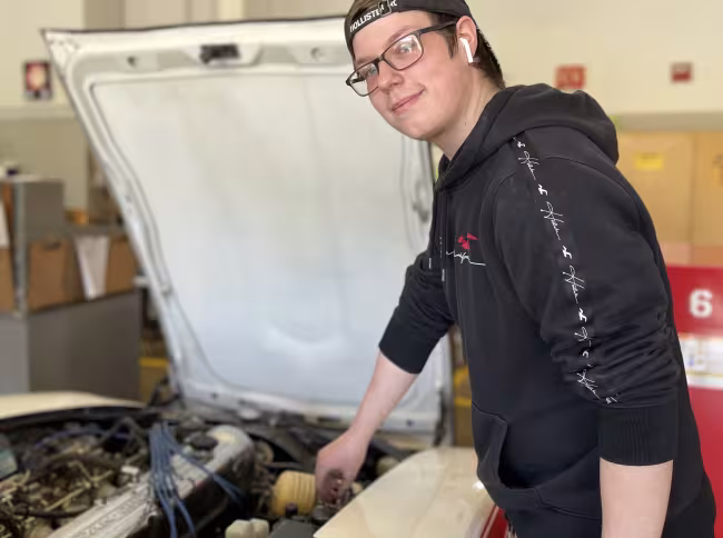 Winter Proper working on a car.