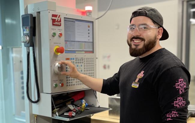 Gaspar Vizcarra posing in the shop.