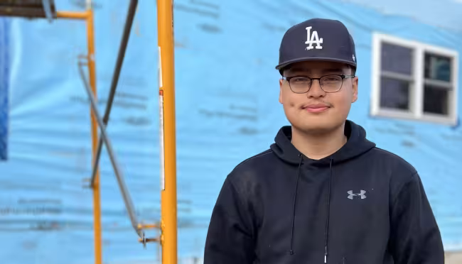 Portrait of Cesar Mejia at a worksite. 