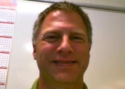 Headshot of Greg Cprfixsen.