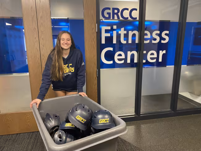 Karissa Ferry working in the fieldhouse.