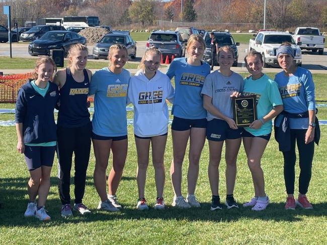 GRCC women's cross country team posing after the race.