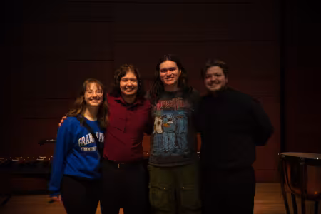 James Duvien poses with three other people.