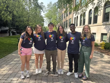 Six students pose wearing GRCC Pride 2025 shirts. 
