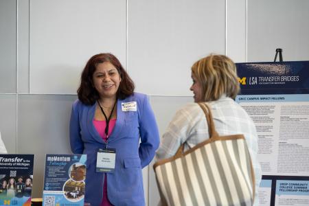 A student presents her accomplishments at the 2025 Honors Showcase.