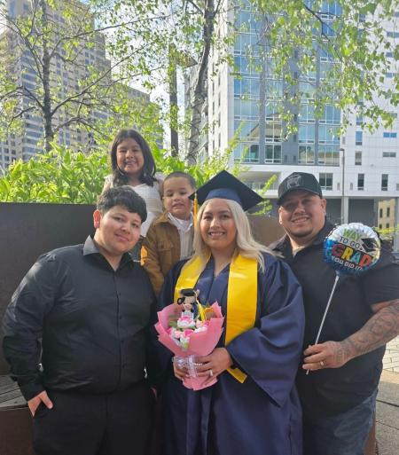 Yesenia and her family celebrate at commencement.