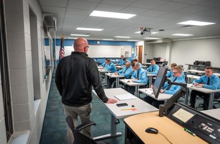 Police Academy students listen to a lecture in a GRCC classroom.