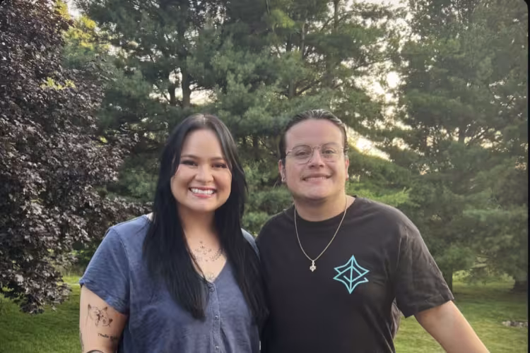 GRCC student Marilyn Preisner poses outside next to her brother Colin Preisner.