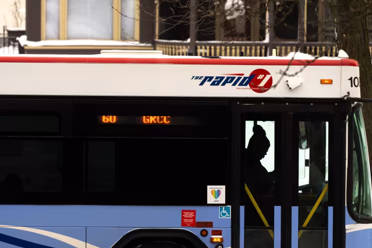 A photo of The Rapid bus making a stop. 