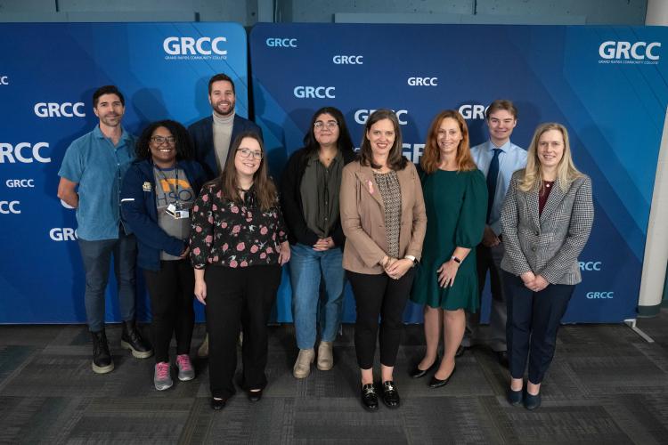 Rep. Glanville poses with GRCC staff.