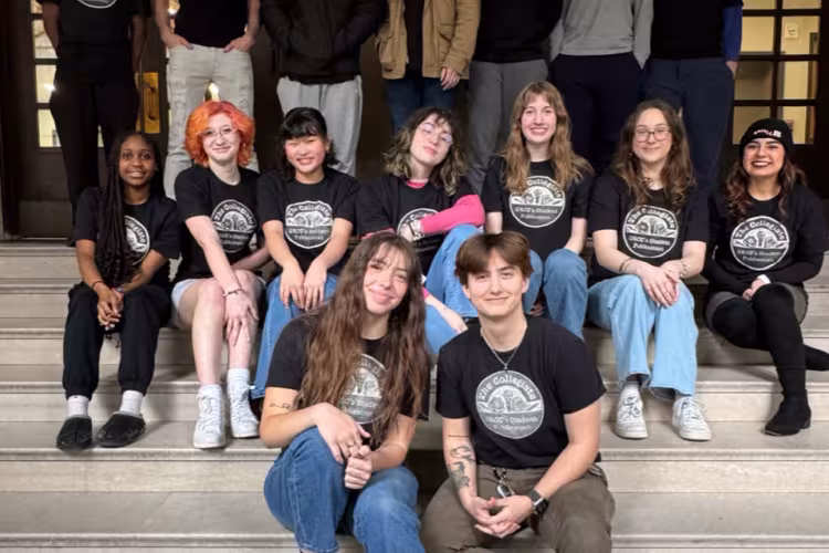 16 members of the staff of The Collegiate