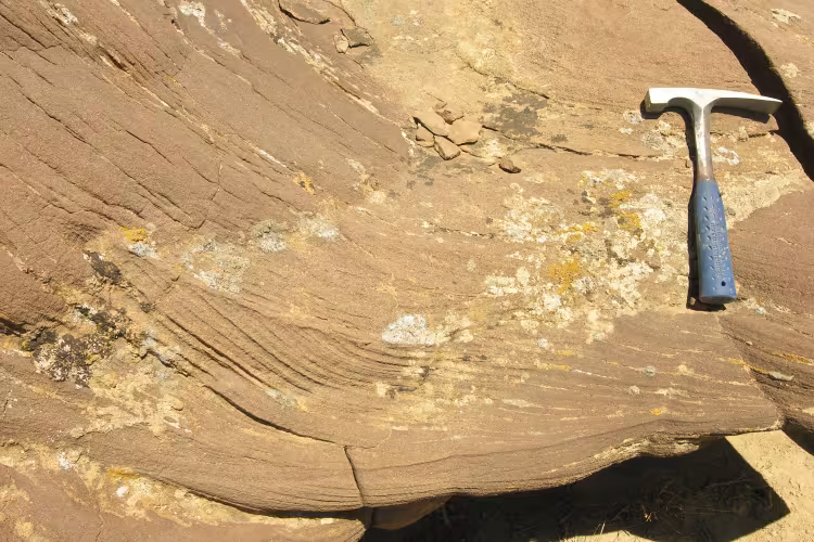 A hammer lies on a rock in 12-mile Gulch in Wyoming