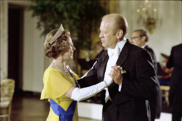 Queen Elizabeth II and President Gerald R. Ford waltzing.
