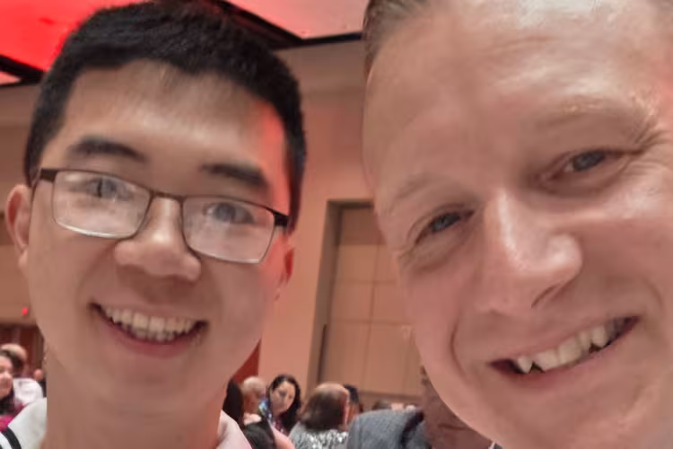  Culinary Specialist First Class Haiwen Wu (left) with Senior Chief Culinary Specialist Gary Askins