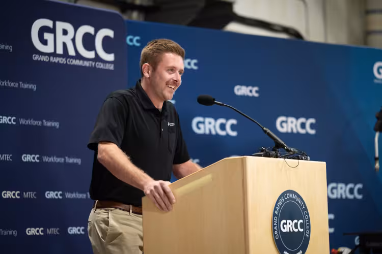 Cody Langlois speaks during a press conference for the GRCC Automation Lab.