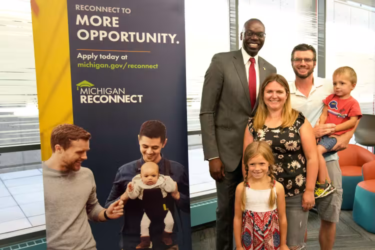 Lt. Governor Garlin Gilchrist II poses with Morgan Brink and her family.