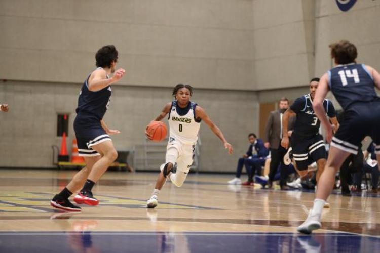 Danyl Bibbs driving toward the basket.