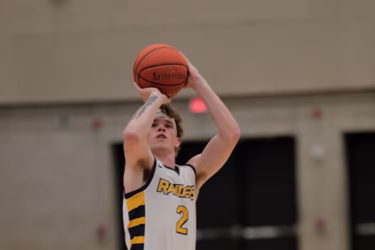 Brock Kohler shooting a fgree throw.