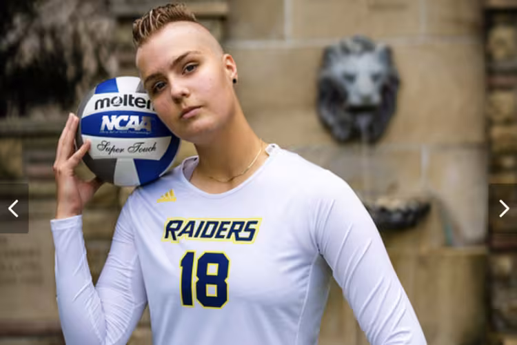 Alena Visnovsky posing with a volleyball.