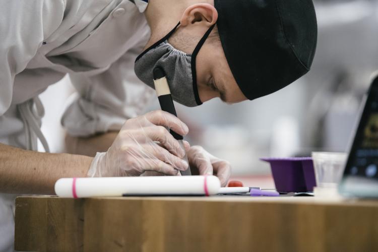 Kohl Goldsmith working on a gingerbread project.
