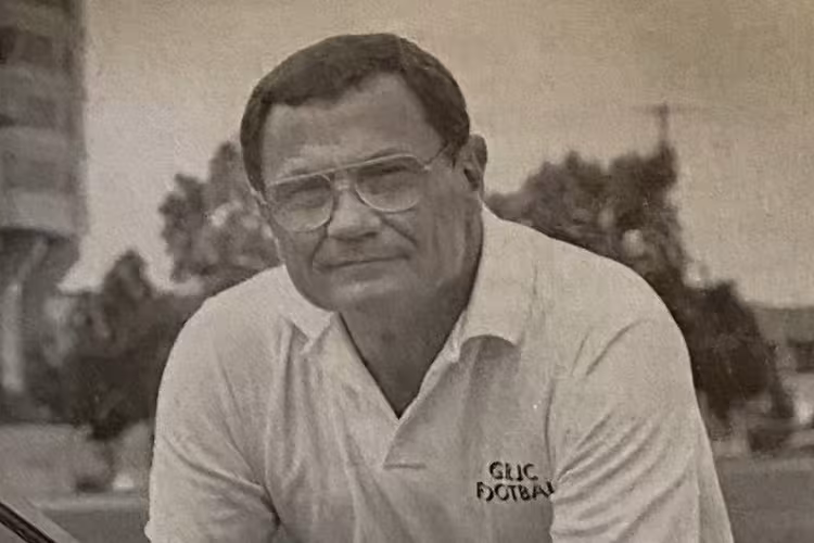 Portrait of Fred Julian on the football field.