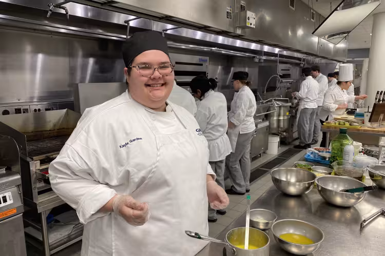 Avery Gardner working in a GRCC kitchen lab.