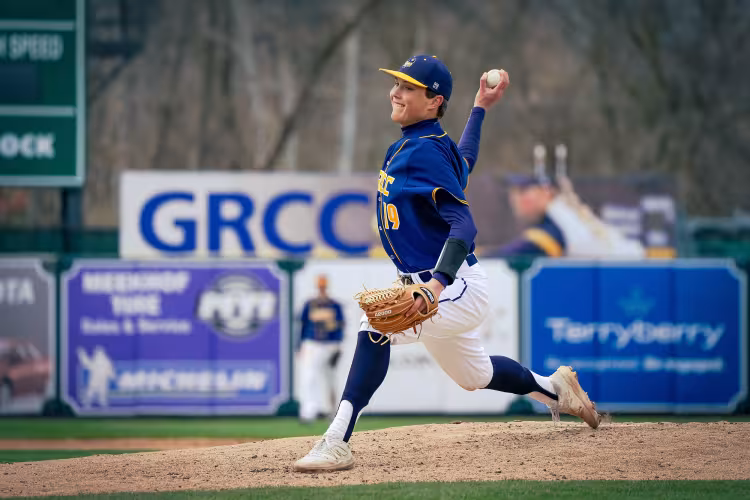 A GRCC baseball player at LMCU Ballpark in 2022.