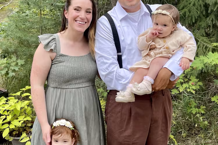George Muyskens poses with his family