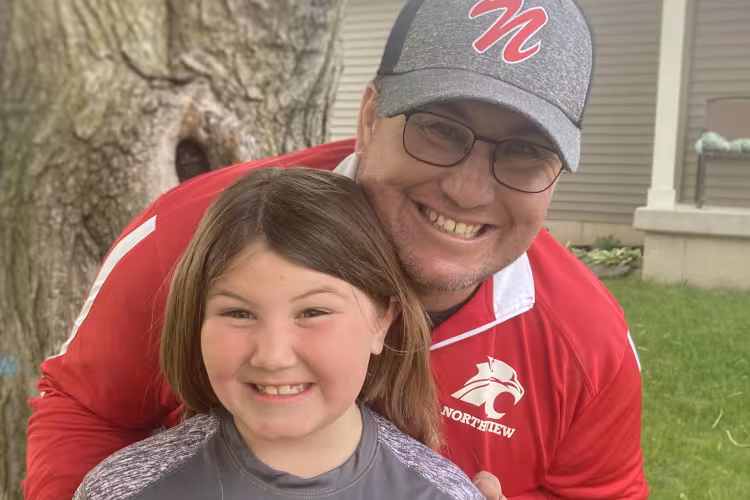 Jason Reckner with his daughter.