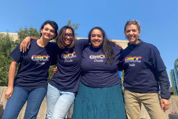 GRCC team members showing off the GRCC Pride shirts that will be handed out at the Pride events.