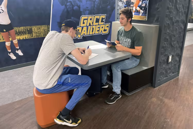 Mentor Blake Waibel working with student-athlete Payton Chase.