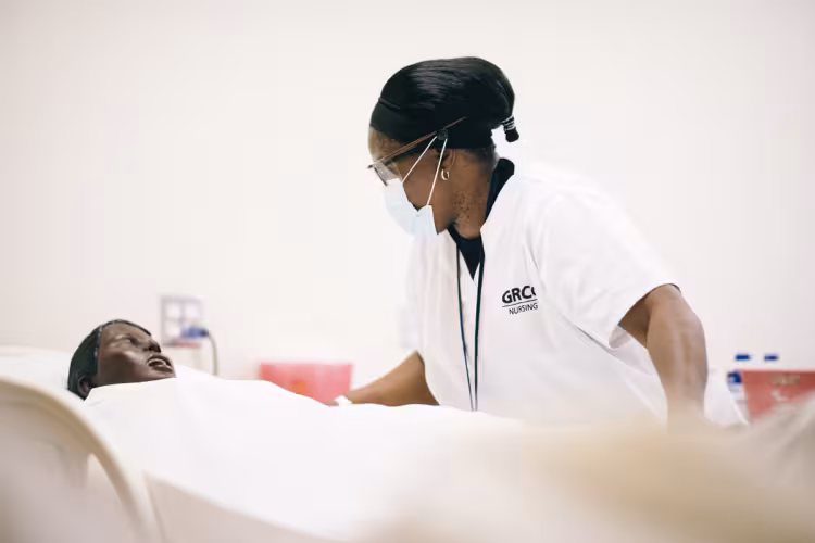 Nursing student working in a lab.