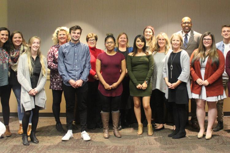 President Pink, Provost Chesley, Rebecca Brinks and Tricia Siegel stand with scholarship recipients.