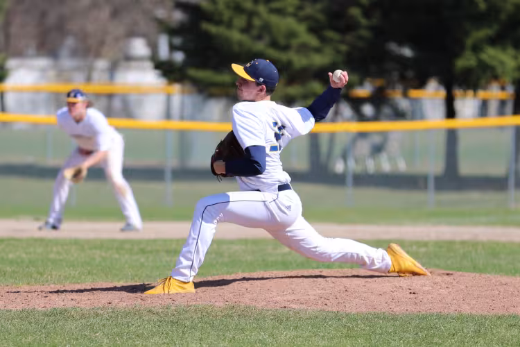 Logan Campbell pitching as a Raider.