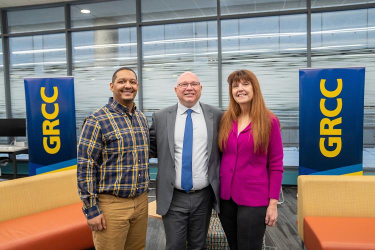 GRCC President Lepper with studens Andre Broussard and Jodi Holland. 