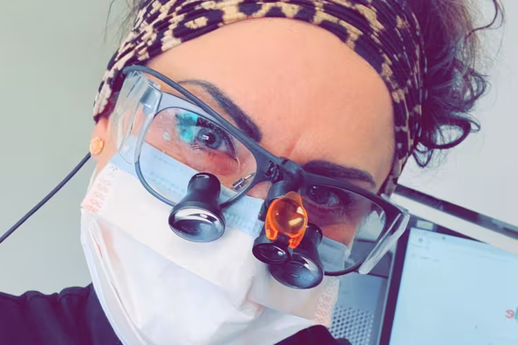 Portrait of Michelle Murdoch wearing her dental gear.
